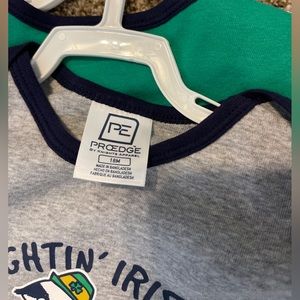 Notre Dame Fighting Irish onesies two pack brand new. 18 months.